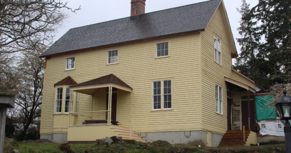 Photo by Karina Andrew/Whidbey News-Times
The Haller House is primed for its final paint job, which will be brown and tan.