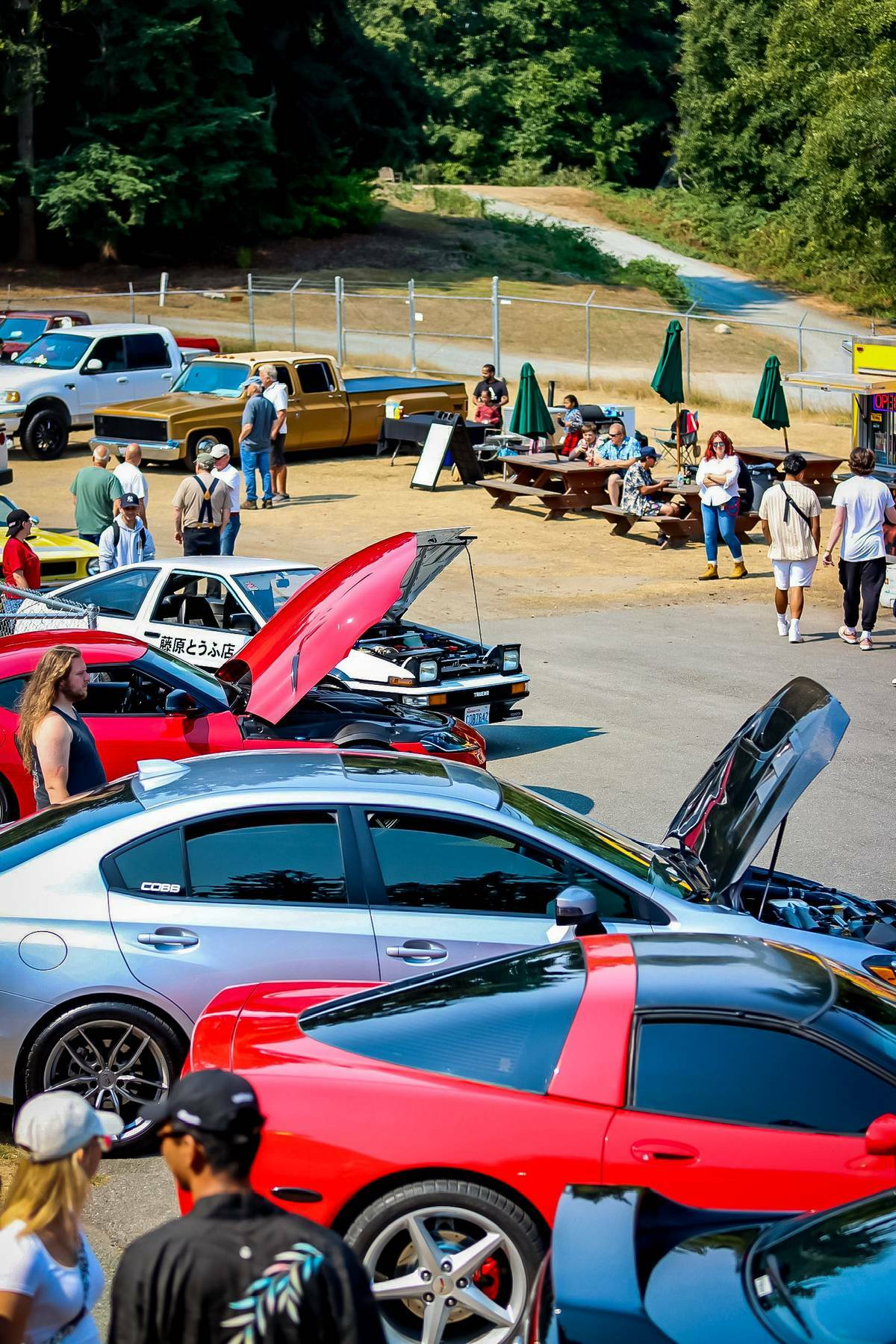 Popped car hoods were a common sight at last year’s automobile festival at the Whidbey Island Fairgrounds. (Photo provided)