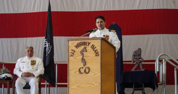 Photo by Sam Fletcher
Commanding Officer Capt. Eric Hanks addresses Naval Air Station Whidbey Island for the last time.