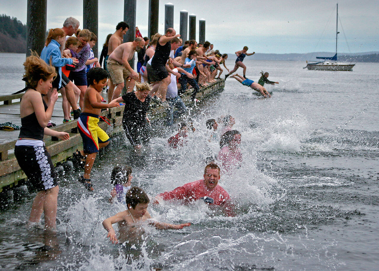 Photo by David Welton
Participants of the 2006 polar plunge leapt off Freeland Dock and into Holmes Harbor. The dock is scheduled to undergo some repairs.