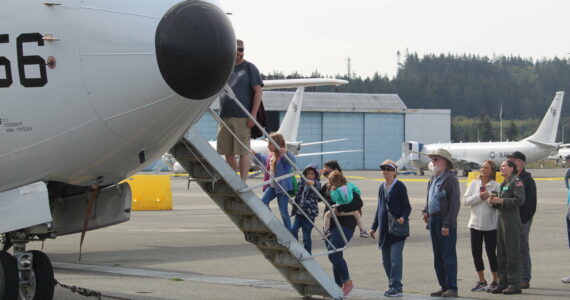 Photo by Karina Andrew
Guests tour the flightline at Naval Air Station Whidbey Island at a previous open house.