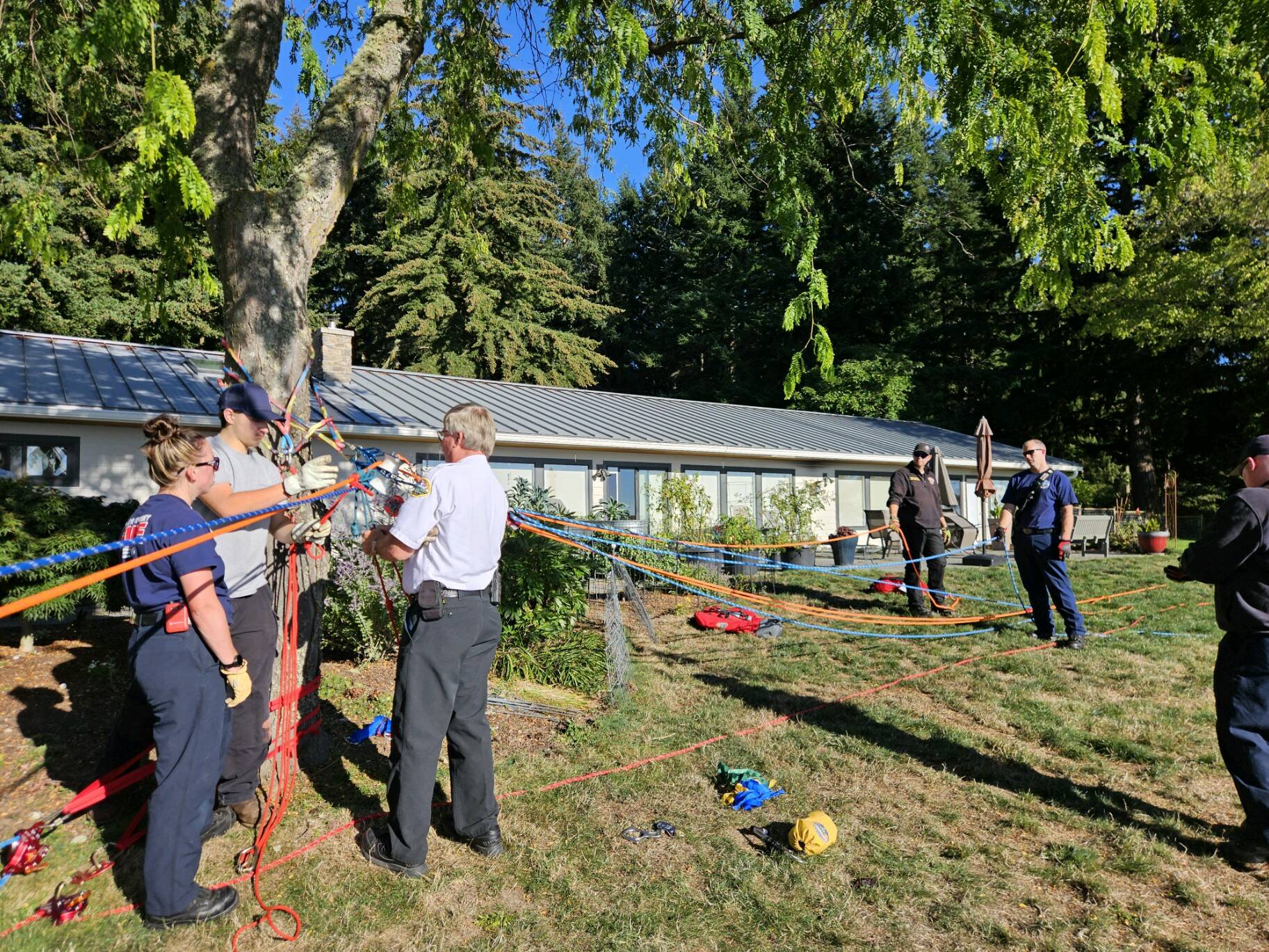 First responders from South Whidbey Fire/EMS fashioned a rope system to rescue two dogs in Clinton Monday afternoon. (Photo provided)