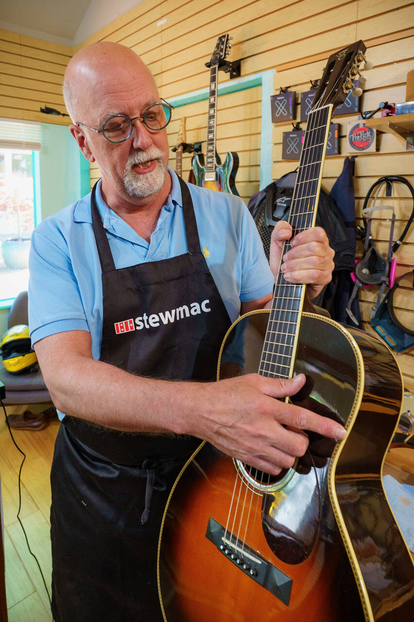 Darrell Pope is the owner of the Village Luthier, a new instrument repair business in Langley. (Photo by David Welton)