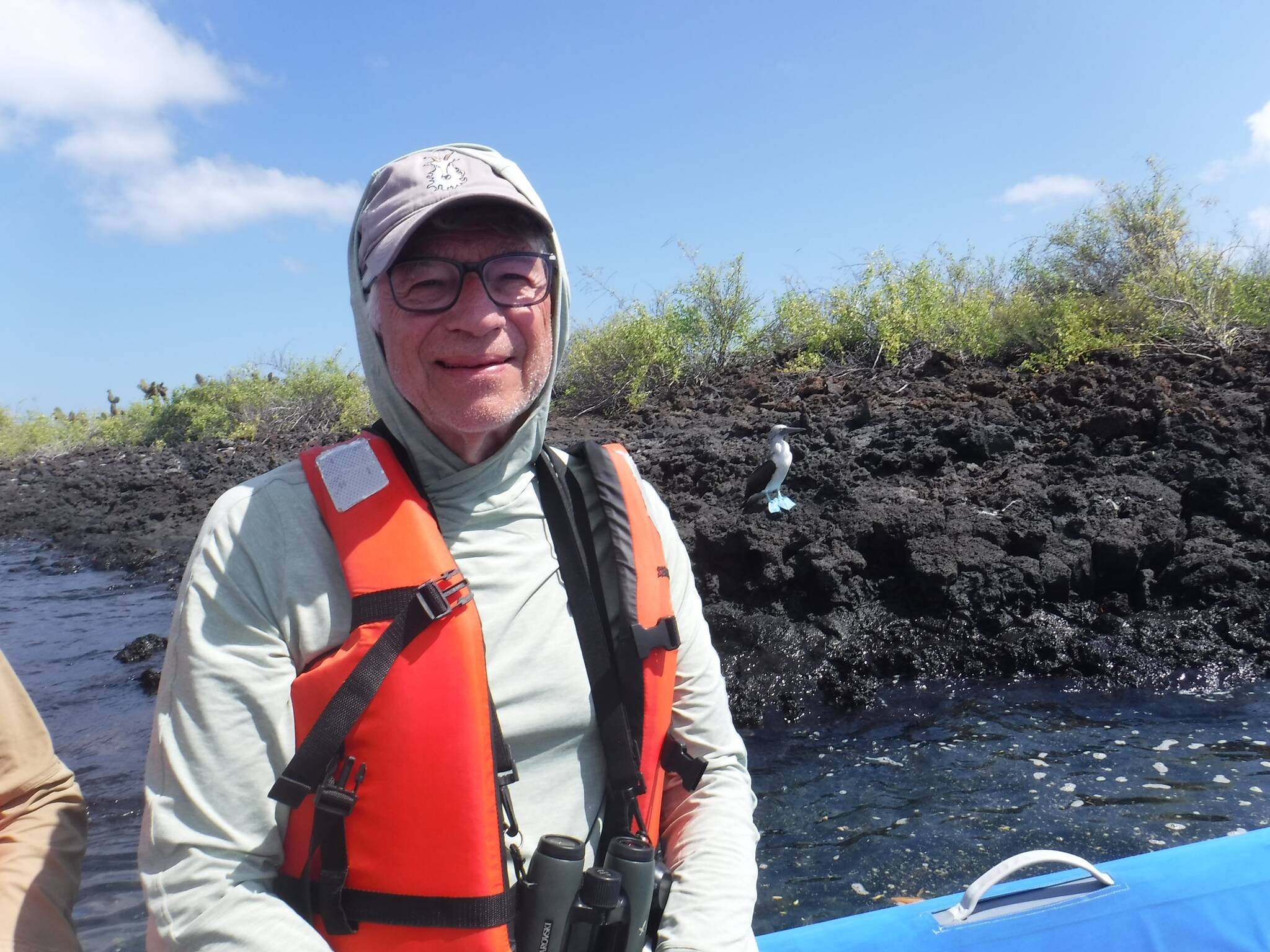 Photo provided
David Parent with a blue-footed booby on the Galapagos Islands.