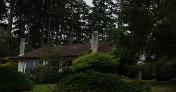 A house on Northeast Third Street in Coupeville suffered some damage to the bathroom but ultimately survived a Monday blaze. (Photo by Sam Fletcher)