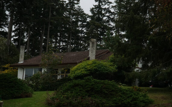 A house on Northeast Third Street in Coupeville suffered some damage to the bathroom but ultimately survived a Monday blaze. (Photo by Sam Fletcher)