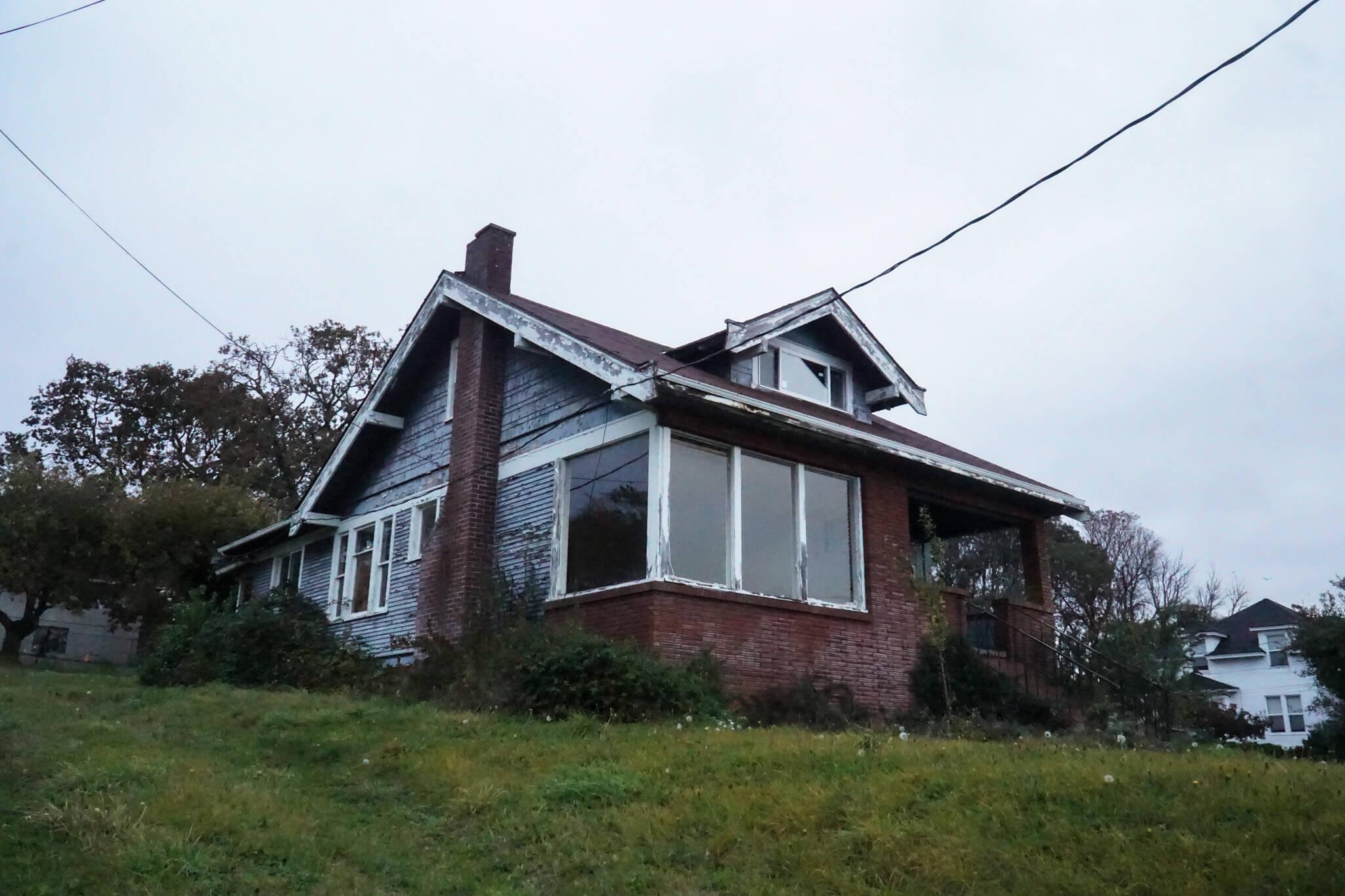 The empty house on Pioneer Way was built in 1925 by Otto Van Dyke, the builder of the Roller Barn, and was owned by the Maylor family for nearly a century.