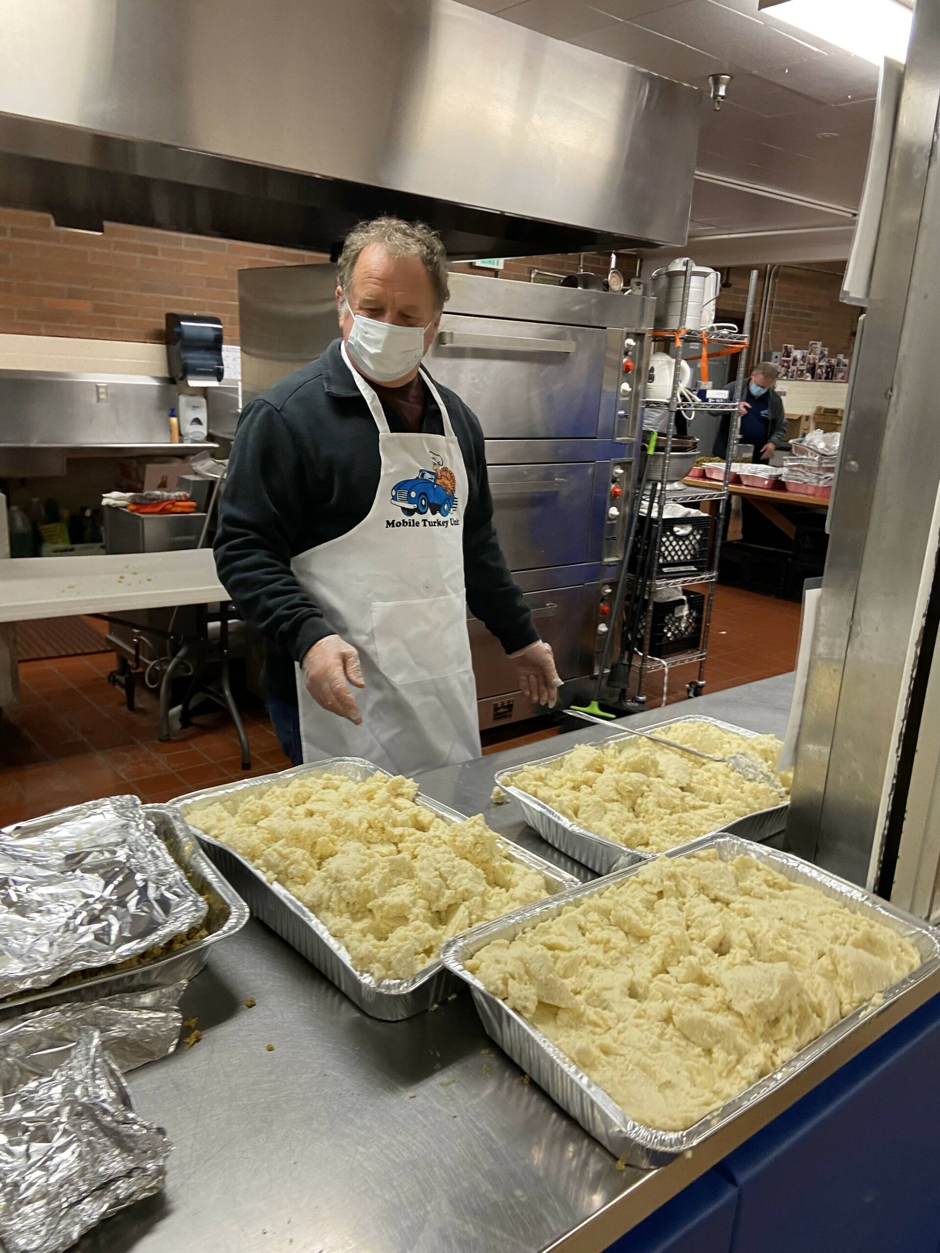 Photo provided
Dave Johnson serves up some mashed potatoes during a previous Mobile Turkey Unit.