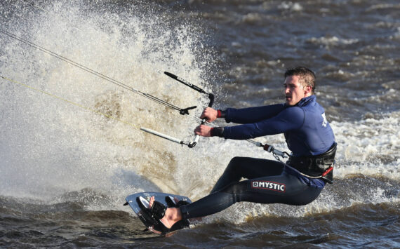 Photo by John Fisken
A kitesurfer takes advantage of the windy weather on Whidbey to catch waves on Swan Lake Monday.