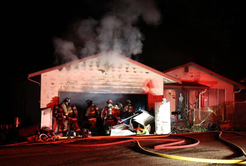 <p>Oak Harbor Fire Department, North Whidbey Fire and Rescue and Naval Air Station Whidbey Island Fire Department responded to a residential fire on Northwest Illahee Drive Tuesday night. (Photo by John Fisken)</p>