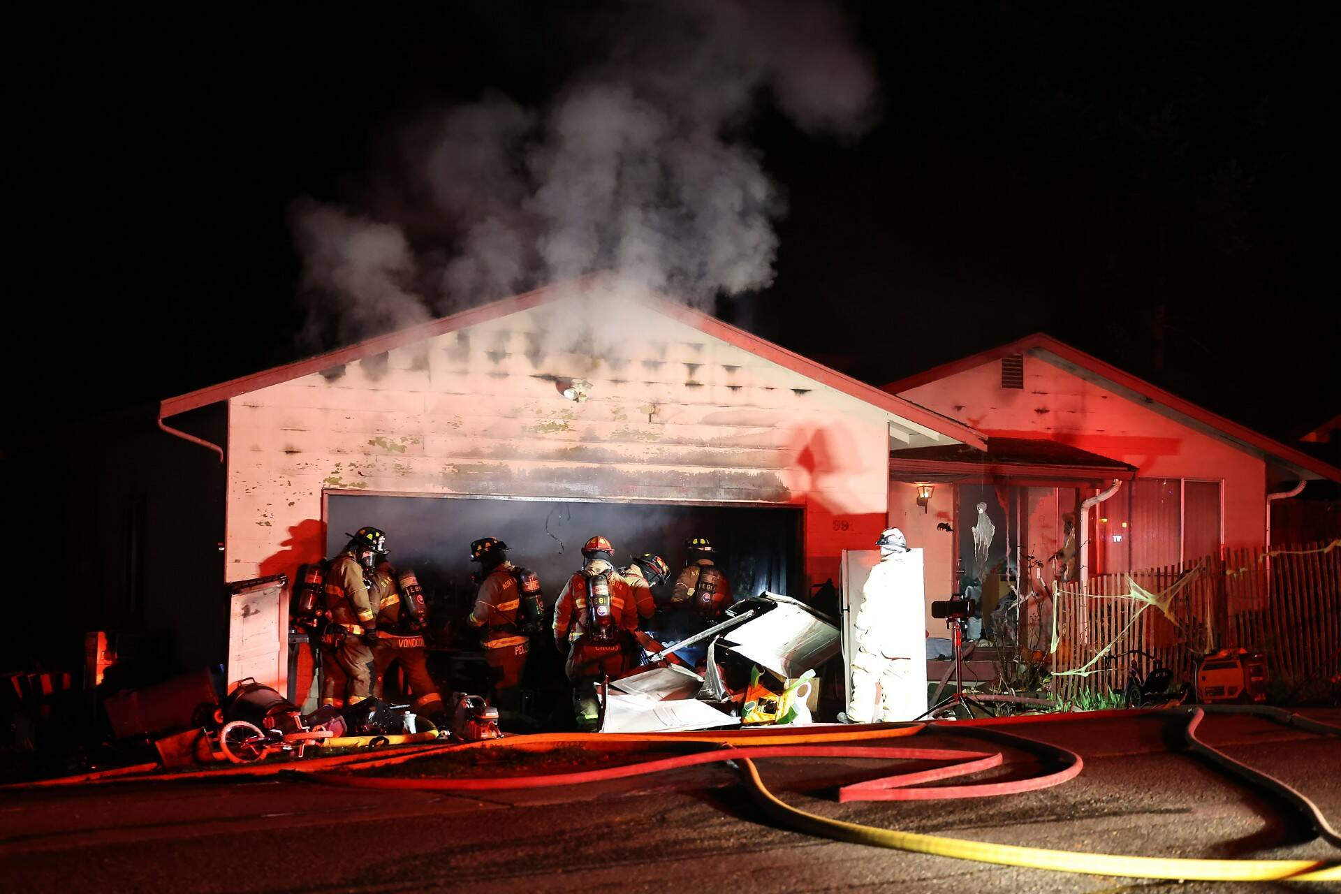 Oak Harbor Fire Department, North Whidbey Fire and Rescue and Naval Air Station Whidbey Island Fire Department responded to a residential fire on Northwest Illahee Drive Tuesday night. (Photo by John Fisken)