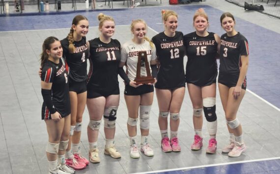 Photo provided
Seniors of the Coupeville High School volleyball squad pose with their trophy.