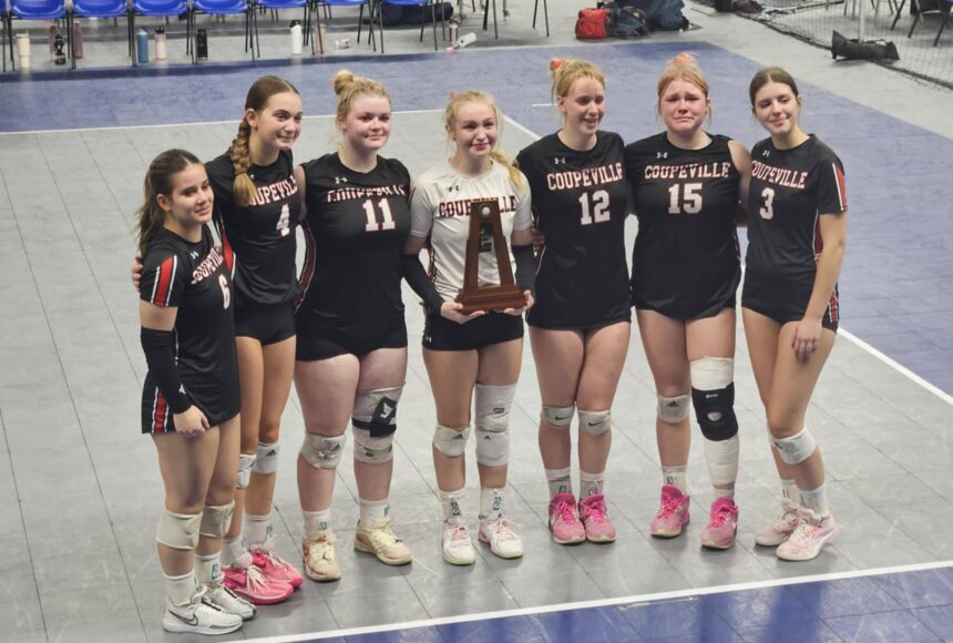 <p>Photo provided</p>
                                <p>Seniors of the Coupeville High School volleyball squad pose with their trophy.</p>