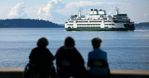 A ferry heads out from Mukilteo toward Clinton during the evening commute in 2022. (Ryan Berry / The Everett Herald)