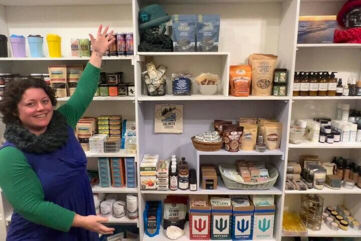 Emily Wilder prepares items at the new shop, Salinity at the Bard’s Boutique at Bayview Corner, which opens on Sunday, Dec. 1.