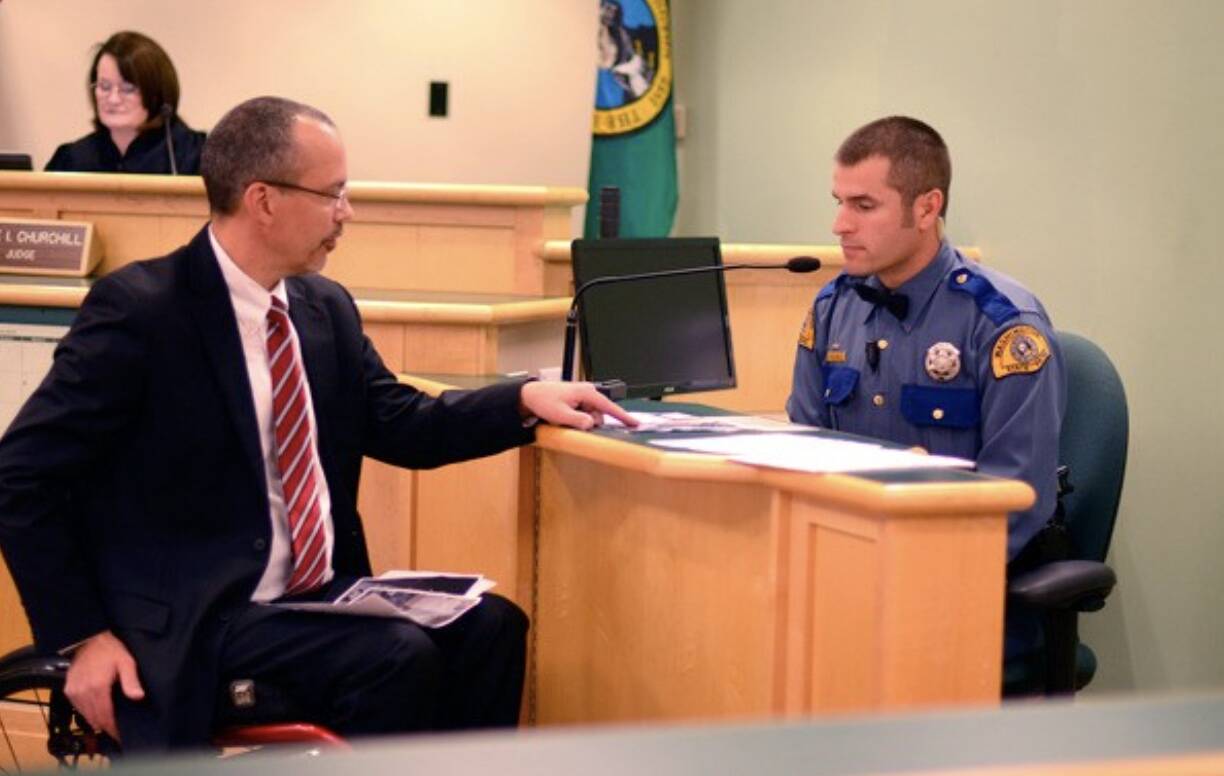 Chief Criminal Deputy Prosecutor Eric Ohme questions a state trooper during a vehicular homicide case.