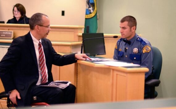 Chief Criminal Deputy Prosecutor Eric Ohme questions a state trooper during a vehicular homicide case.