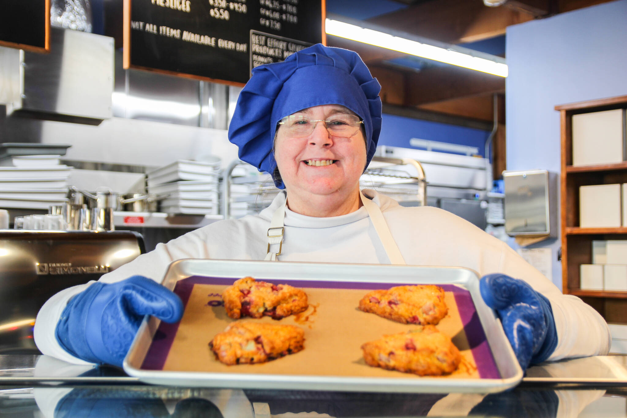 (Photo by Luisa Loi)
Teri Harget holds some freshly-baked strawberry rhubarb scones.