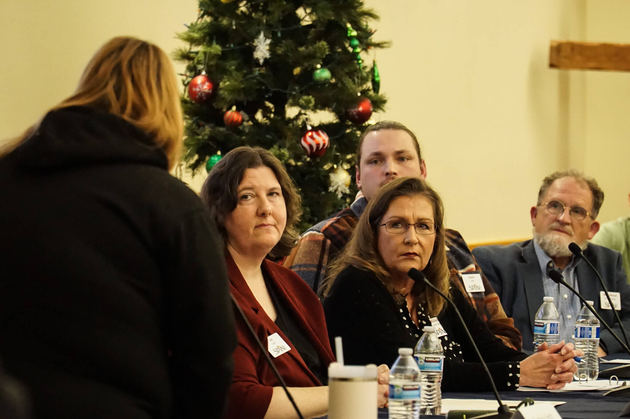 (Photo by Sam Fletcher)
SPiN Cafe board members Valerie Roseberry, Michele Hines, Mark Stroud and David Thorns listen to a comment from Jamie Sherwin at a town hall meeting Wednesday night.