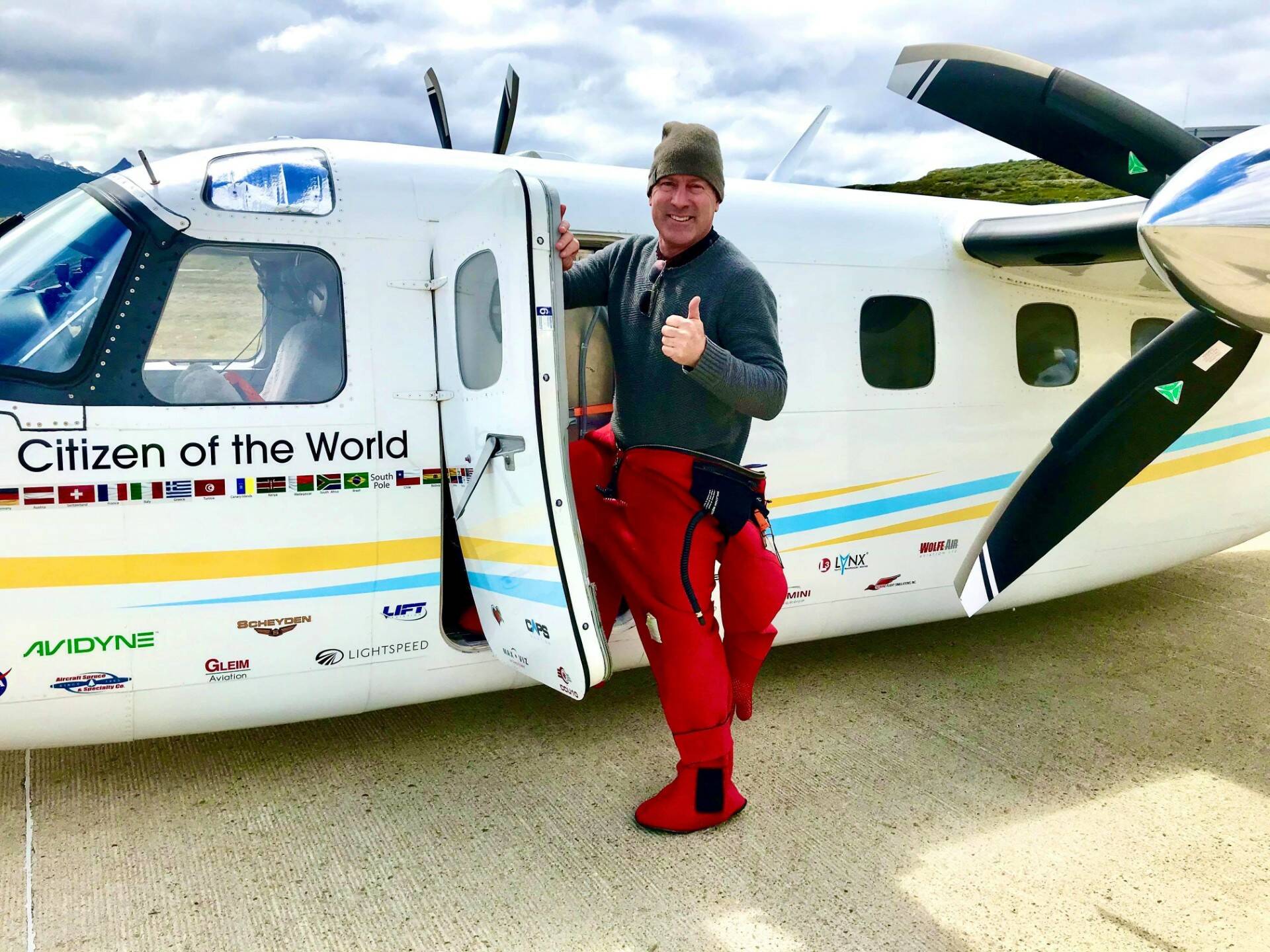 (Photo provided)
Seasoned pilot Robert DeLaurentis poses with Citizen of the World, a plane that took him around the world before crashing early this week.