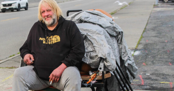 (Photo by Luisa Loi/Whidbey News-Times)
Jeff Pangburn, 55, sits on his cart on Southwest Barlow Street in Oak Harbor.