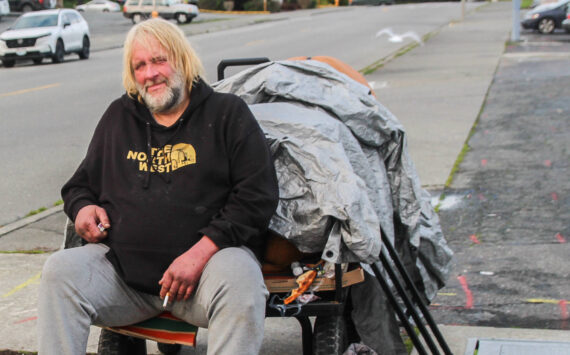 (Photo by Luisa Loi/Whidbey News-Times)
Jeff Pangburn, 55, sits on his cart on Southwest Barlow Street in Oak Harbor.