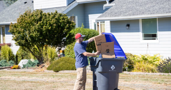 Photo provided
An Island Disposal customer fills a recycling container.