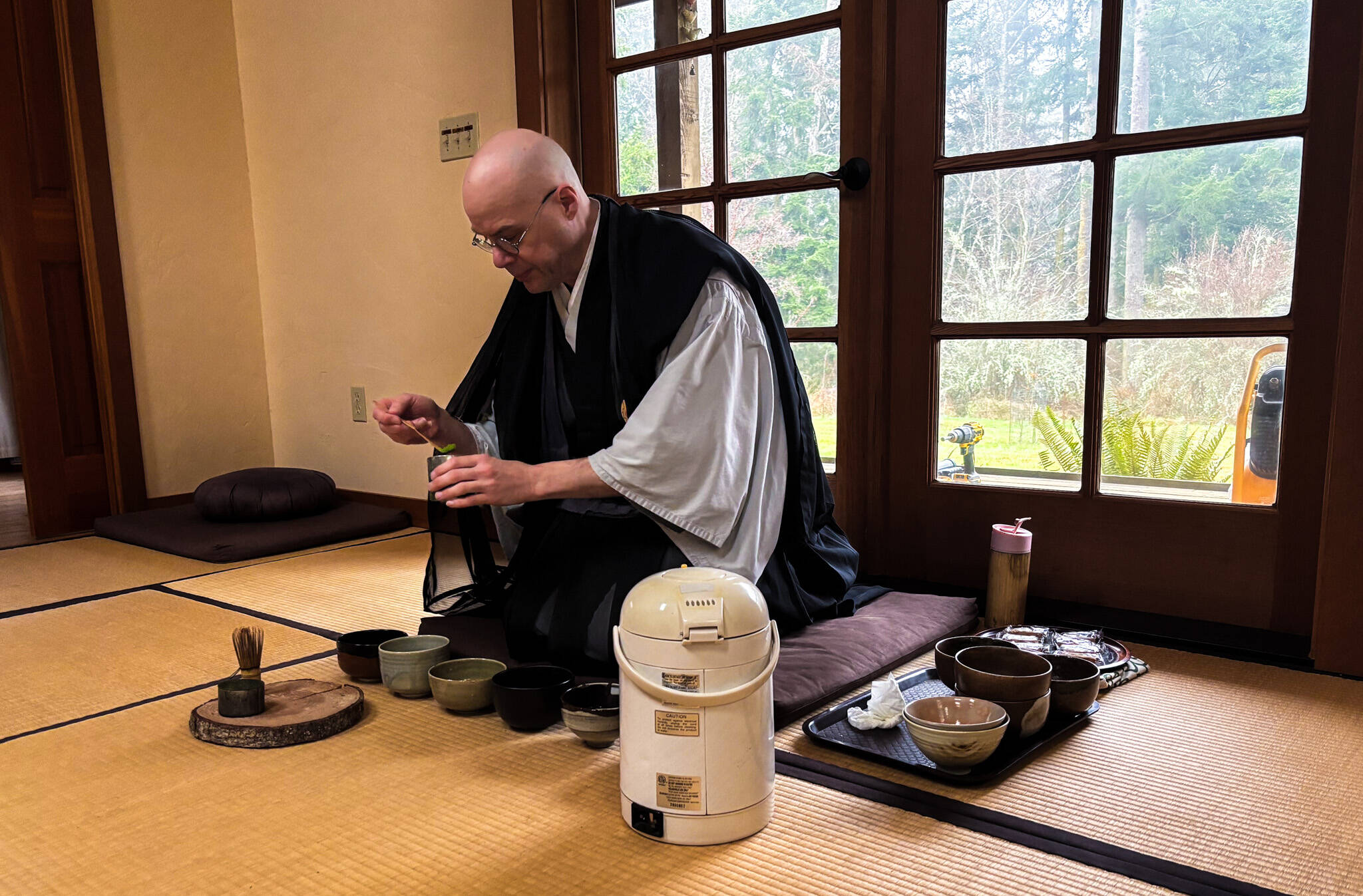 (Photo by Sam Fletcher)
Tendo, head monk at Tahoma One Drop Zen Monastery, leads a tea ceremony.