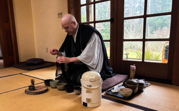 Tendo, head monk at Tahoma One Drop Zen Monastery, leads a tea ceremony. (Photo by Sam Fletcher)